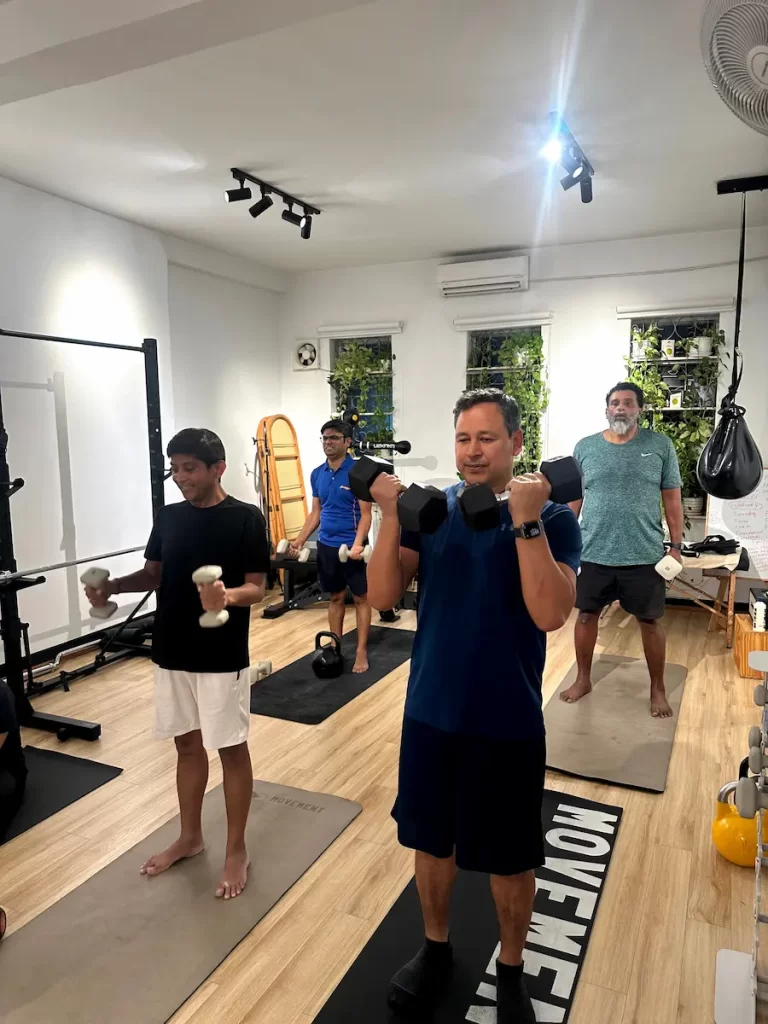 Animal Flow instructor demonstrating balance exercises for expats in Cambodia.