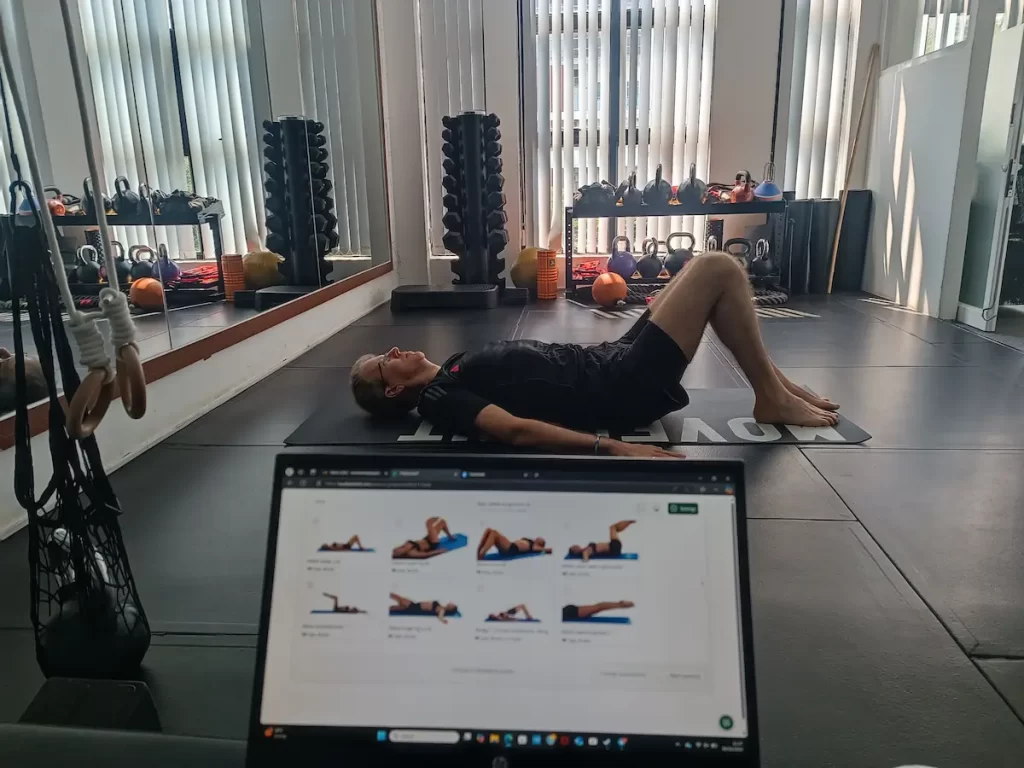 Pilates class participants working on flexibility at Movement Phnom Penh.