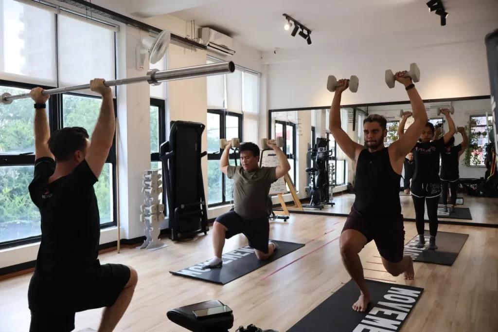Overhead Lunges during our small group class
